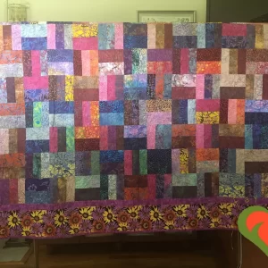 Beautiful Batik and Hoffman Daisy Contemporary Queen Sized Quilt. Measures 80" x 90". Handmade One of A Kind Quilt.