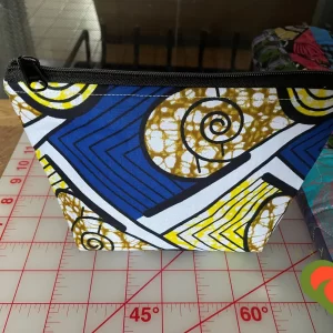 Gorgeous Designer Cosmetic/Jewelry Bag. Made with African Inspired Fabrics. One of a Kind. Great for Gift Giving.