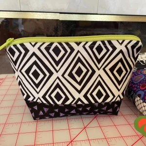 Designer Cosmetic/Jewelry Bag. Made with Black and White and Laurel Burch Fabrics. One of a Kind.