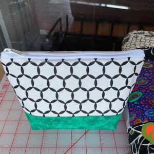 Designer Cosmetic/Jewelry Bag. Made with Black and White and Moda Fabrics. One of a Kind