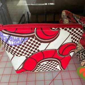 Gorgeous Designer Cosmetic/Jewelry Bag. Made with African Inspired Fabrics. One of a Kind. Great for Gift Giving.