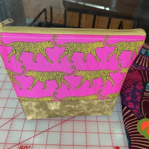 Gorgeous Designer Cosmetic/Jewelry Bag. Made with African Themed Fabric. One of a Kind. Great for Gift Giving.