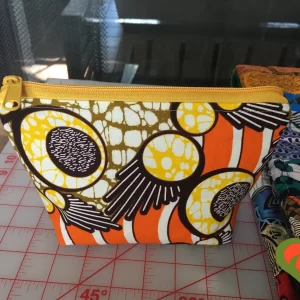 Gorgeous Designer Cosmetic/Jewelry Bag. Made with African Inspired Fabrics. One of a Kind. Great for Gift Giving.
