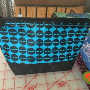 Gorgeous Designer Cosmetic/Jewelry Bag. Made with Designer and African Inspired Fabrics. One of a Kind. Great for Gift Giving.