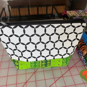 Gorgeous Designer Cosmetic/Jewelry Bag. Made with African Inspired Fabrics. One of a Kind. Great for Gift Giving.