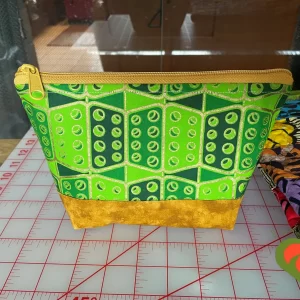 Gorgeous Designer Cosmetic/Jewelry Bag. Made with African Themed and Moda Marble Fabrics. One of a Kind. Great for Gift Giving.