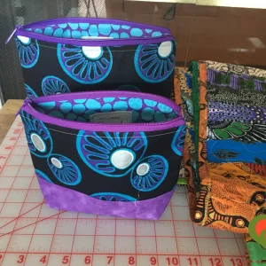 Gorgeous Designer Cosmetic/Jewelry Bags. Made with African Themed Fabric. One of a Kind. Great for Gift Giving.