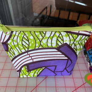 Gorgeous Designer Cosmetic/Jewelry Bag. Made with African Inspired Fabrics. One of a Kind. Great for Gift Giving.
