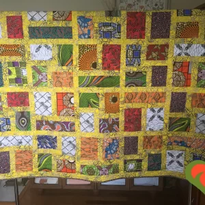 African and Batik Fabrics Quilt-Comfort Quilt-Throw Quilt-Twin Bed Coverlet-Modern Quilt. Handmade One of A Kind Quilt. Measures 64"x 75".