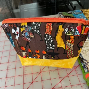 Gorgeous Designer Cosmetic/Jewelry Bag. Made with African Inspired Fabrics. One of a Kind. Great for Gift Giving.
