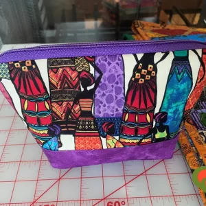 Gorgeous Designer Cosmetic/Jewelry Bag. Made with African Inspired Fabrics. One of a Kind. Great for Gift Giving.