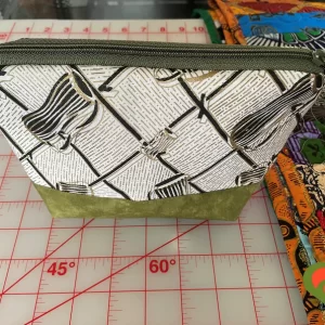 Gorgeous Designer Cosmetic/Jewelry Bag. Made with African Inspired Fabrics. One of a Kind. Great for Gift Giving.