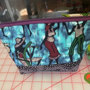 Gorgeous Designer Cosmetic/Jewelry Bag. Made with African Inspired and Laurel Burch Fabrics. One of a Kind. Great for Gift Giving.