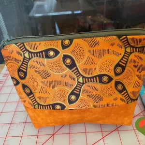 Gorgeous Designer Cosmetic/Jewelry Bag. Made with African Inspired and Moda Fabrics. One of a Kind. Great for Gift Giving.