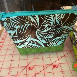 Gorgeous Designer Cosmetic/Jewelry Bag. Made with Batik and Moda Fabrics. One of a Kind. Great for Gift Giving.